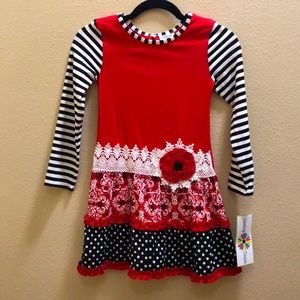 NWT girls size 8 fun patterned dress with flower accent